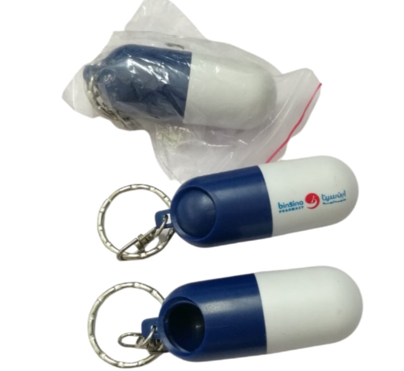 Porte-clés en forme de capsule 