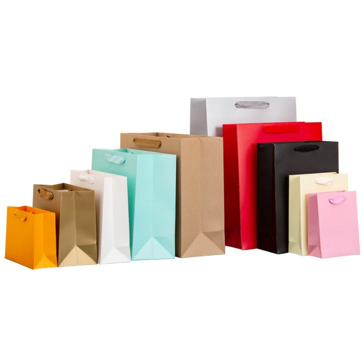 Poignées pour sacs à provisions en papier 
