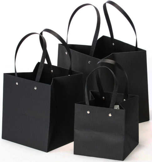 Sac cadeau avec poignées 