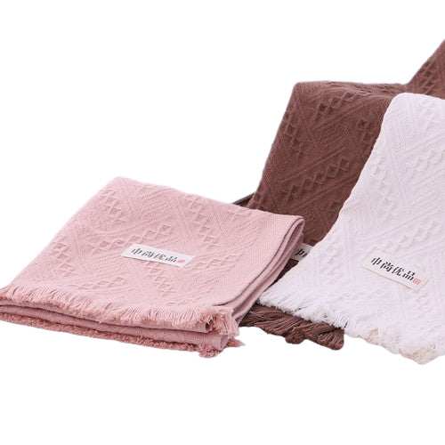 Serviette à pompons 