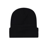 Bonnet en laine tricotée lisse 