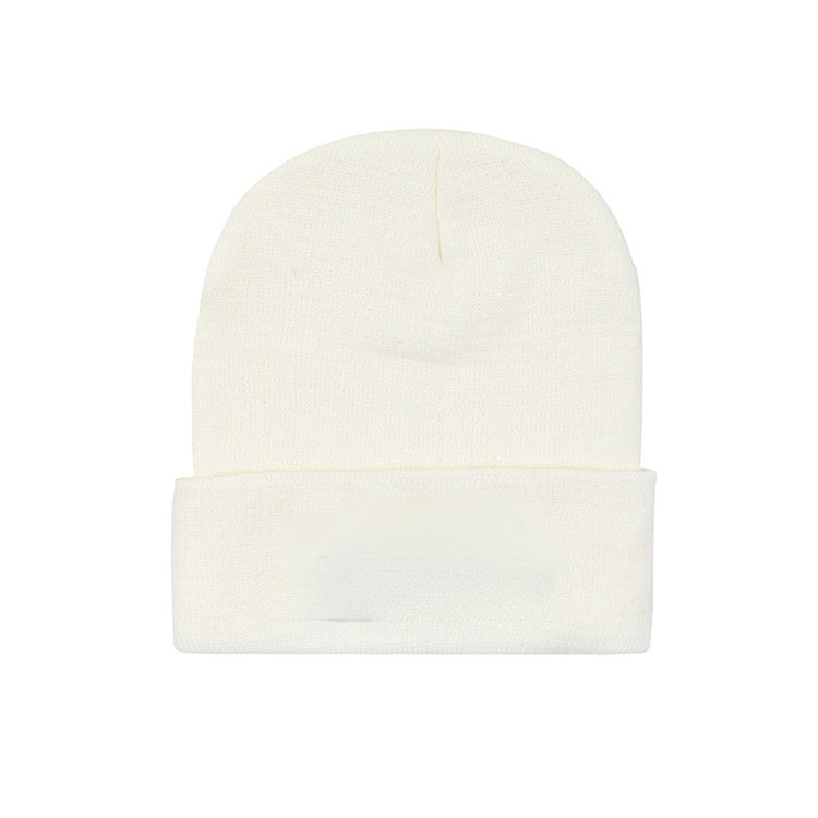 Bonnet en laine tricotée lisse 