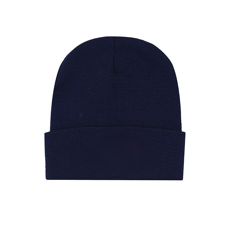Bonnet en laine tricotée lisse 