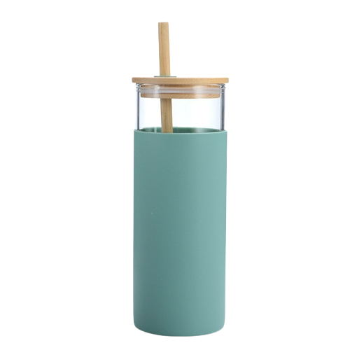 Gobelet en verre avec couvercle en bois et paille 