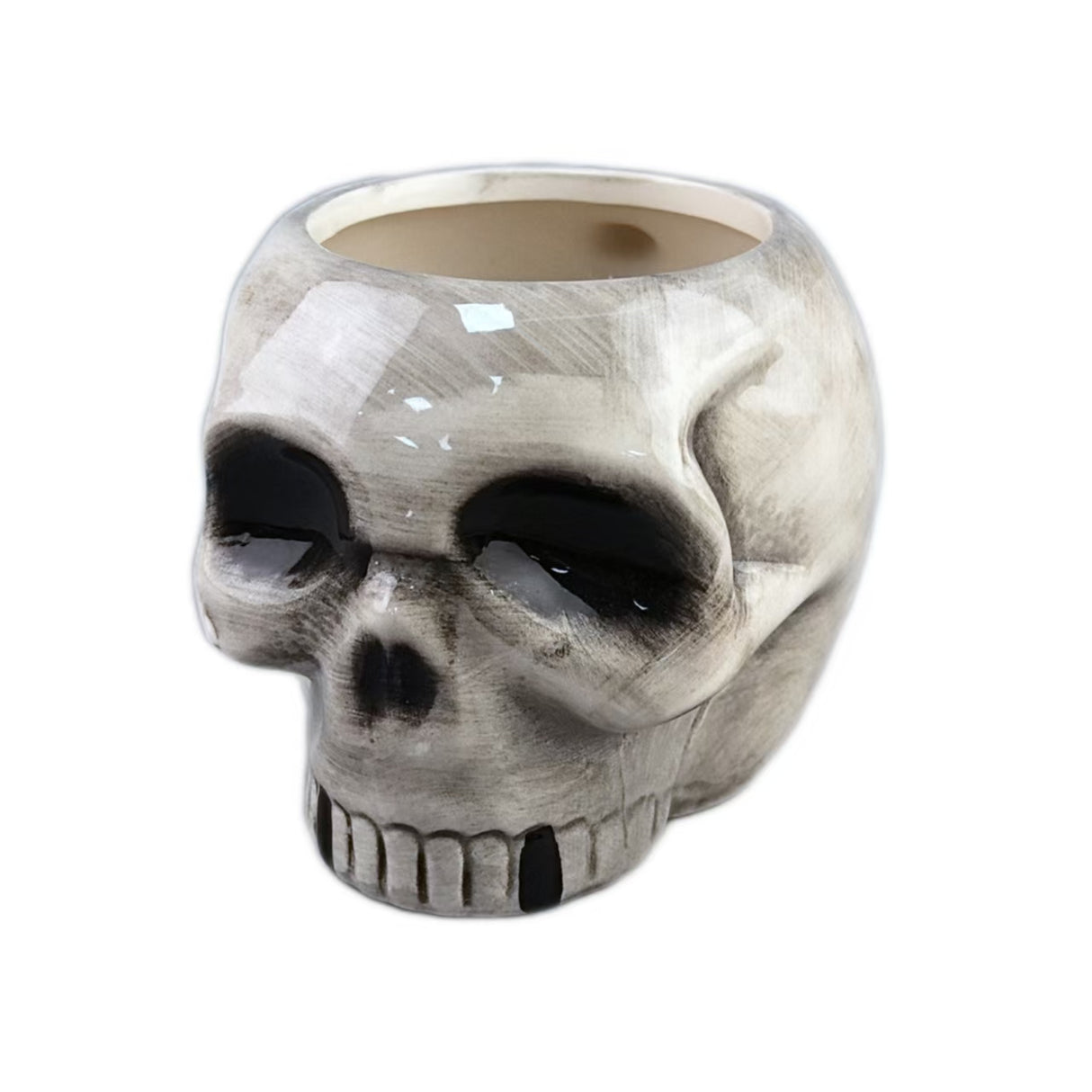 Tasse en céramique en forme de crâne 